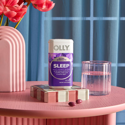 Authentic OLLY 10mg melatonin nighttime sleep aid container on display