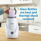 Assembled internal green vent system inside a 250 mL glass infant feeding bottle for colic reduction