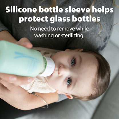 BPA-free borosilicate glass baby bottles being disassembled to show reservoir tube and silicone nipple details