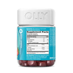 Lifestyle shot of Olly Goodbye Stress bottle with natural elements