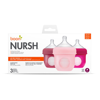Three Boon Nursh baby bottles arranged together