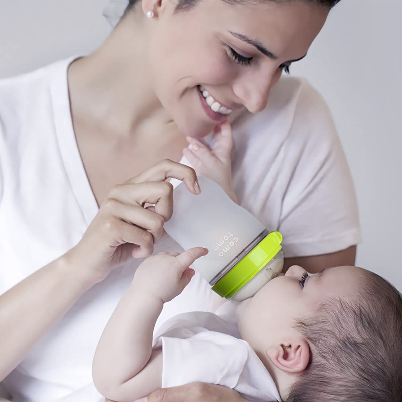 Comotomo baby bottle packaging showing authentic USA import branding