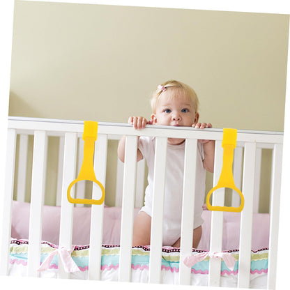 Close up of baby crib pull up ring grip