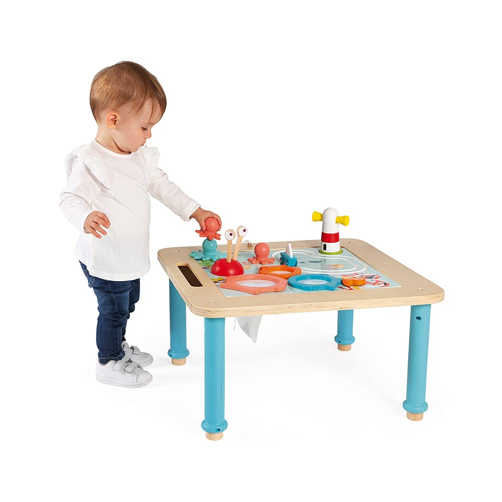 Janod activity table accessories including fish drums and drumsticks