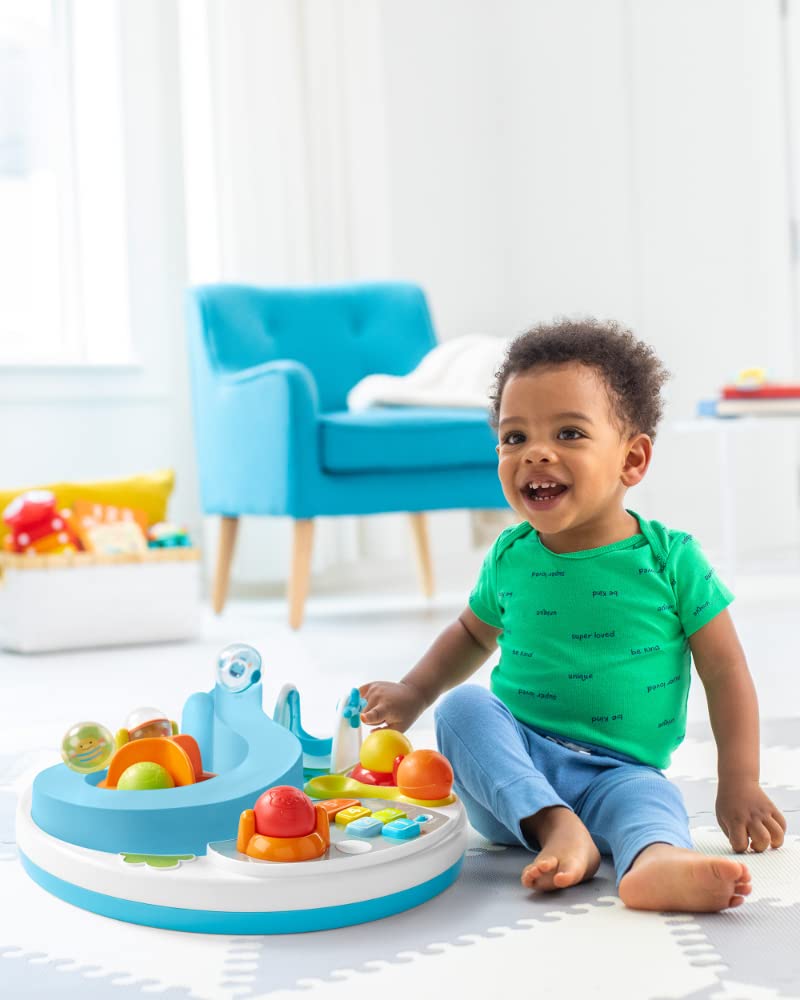 Child playing with Skip Hop Let's Roll floor toy mode