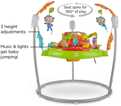 Baby sitting in rotating Fisher-Price Tiger Time Jumperoo