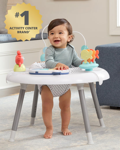Baby using the Skip Hop Seascape 360-degree rotating seat