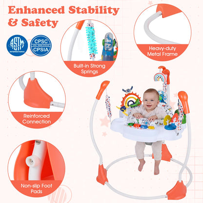 Baby interacting with hanging toys on activity center