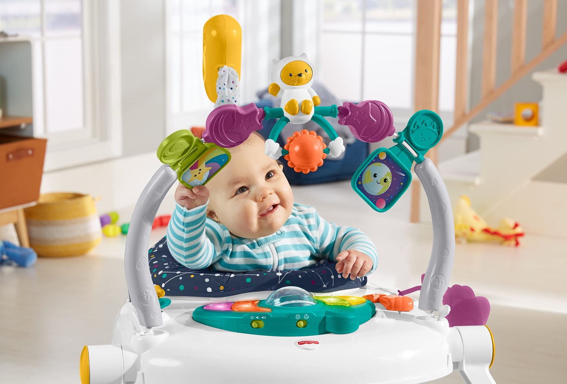 Baby using Astro Kitty SpaceSaver Jumperoo developmental toys