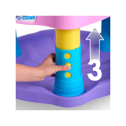 Baby playing with Evenflo Sweet Tea Party interactive toys