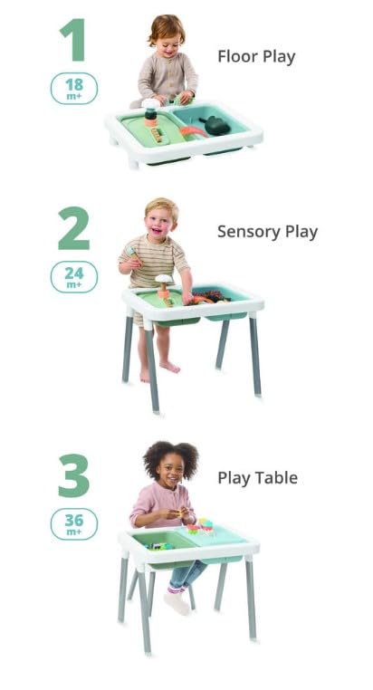 Toddler playing at the Skip Hop sensory table in floor mode