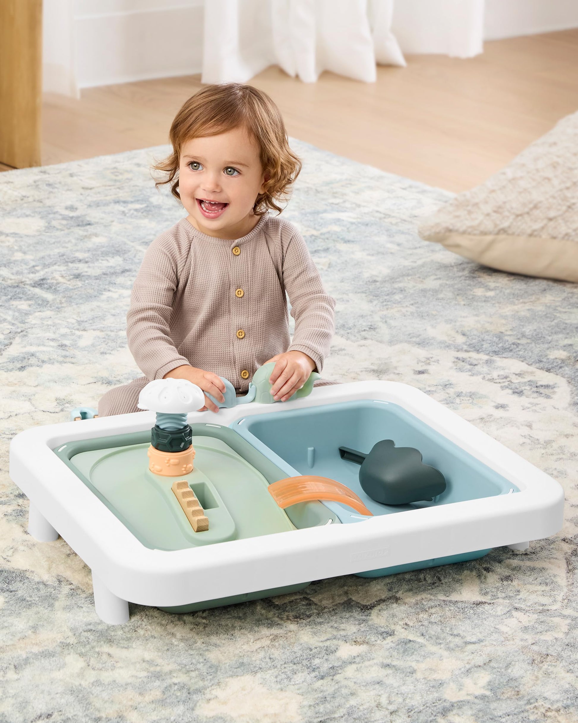 Close up of 13 nature-inspired wooden sensory tools for kids