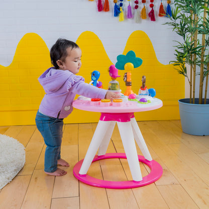 Baby using Bright Starts Around We Go walker mode