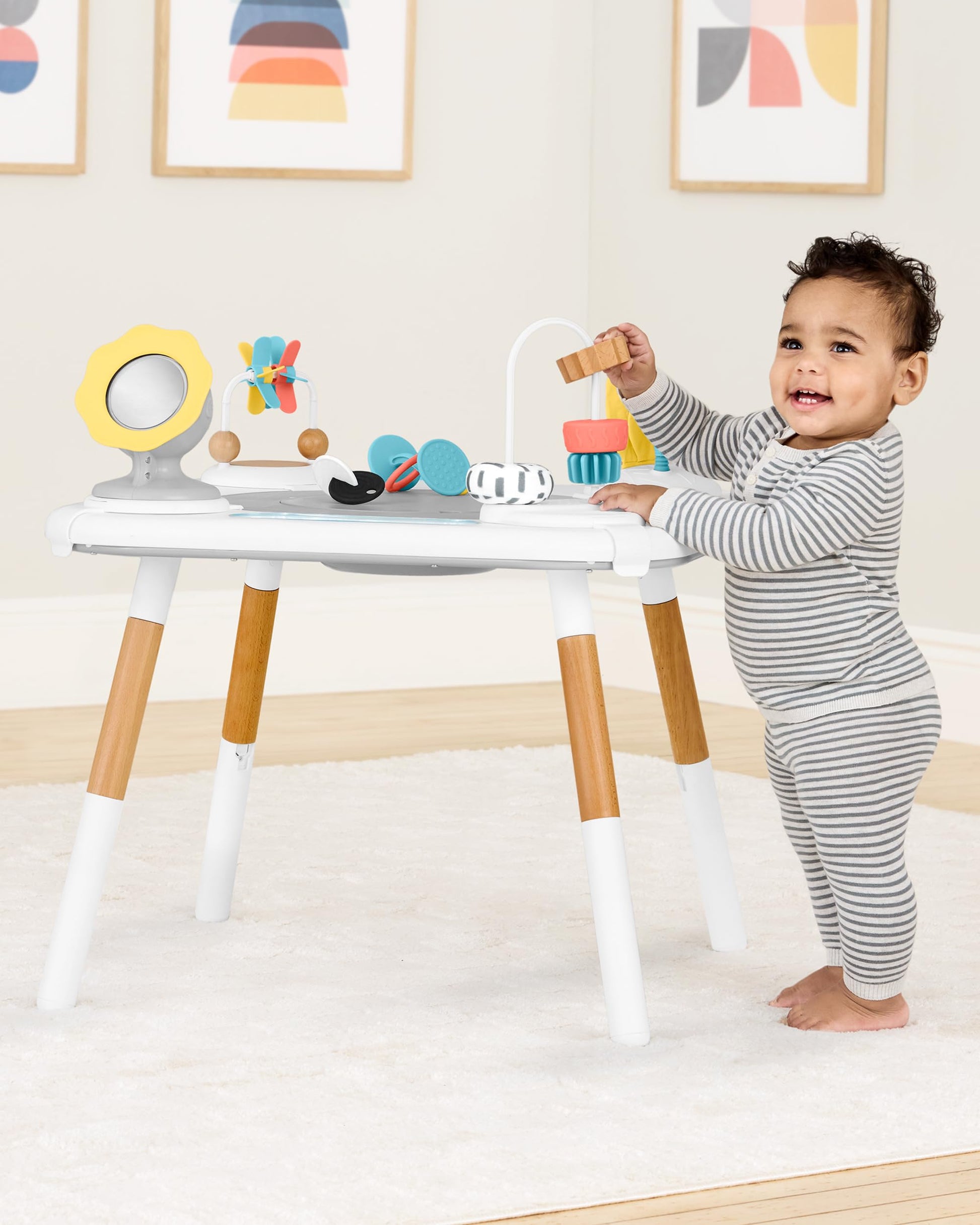 Adjustable foot platform of the Skip Hop 3-Stage activity table