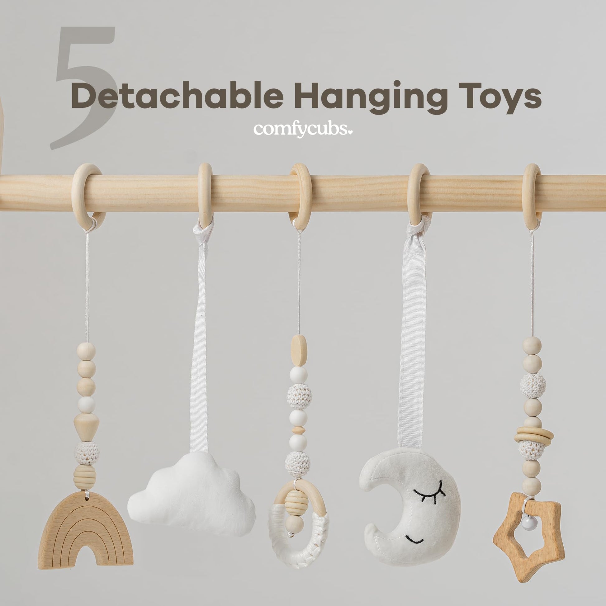 Close up of wooden baby gym frame and sensory toys