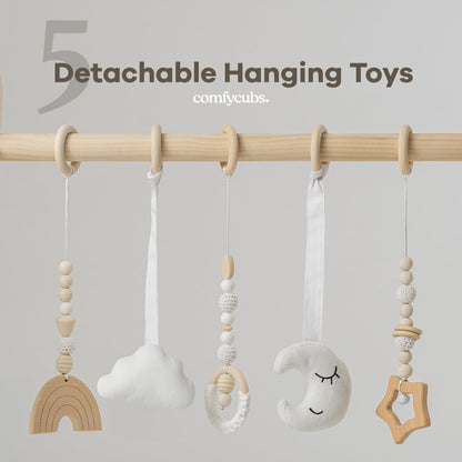 Close up of wooden baby gym frame and sensory toys