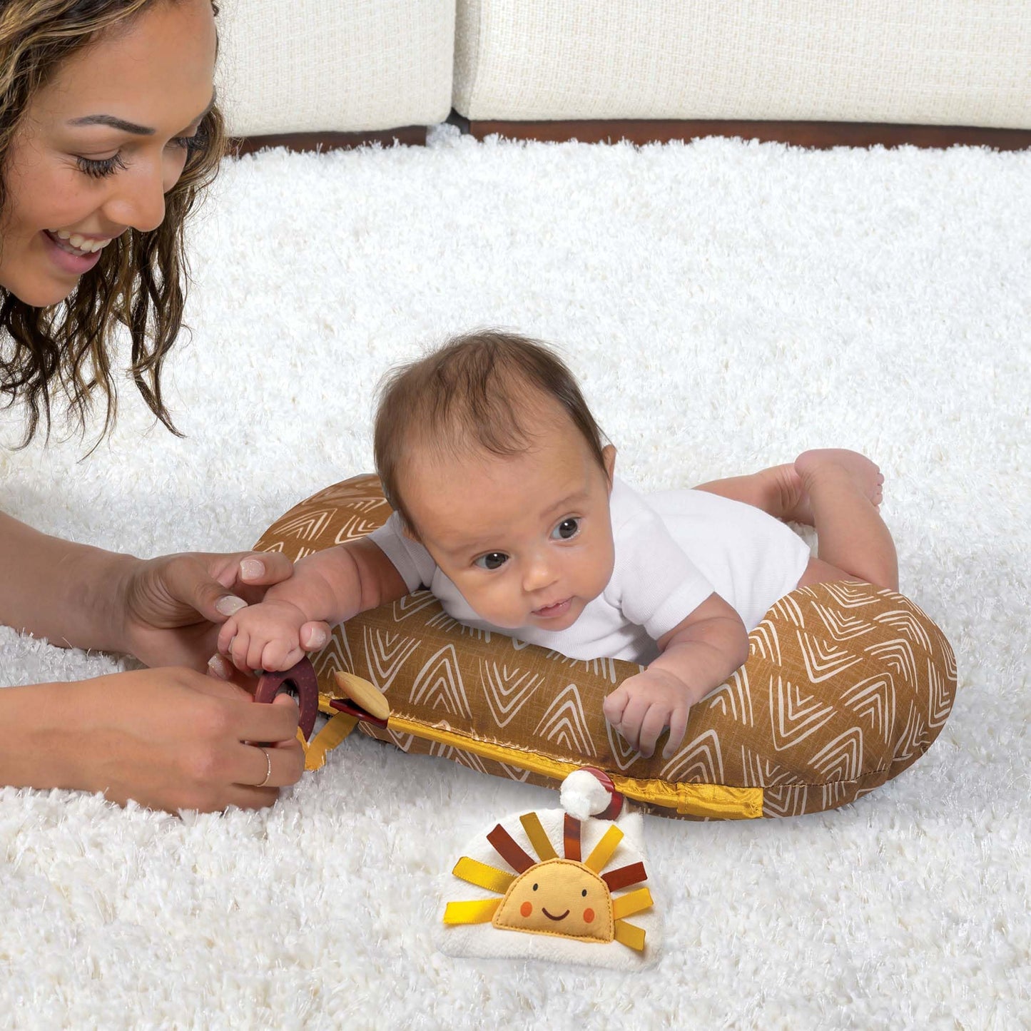 Detail of SlideLine toy attachment system on Boppy prop