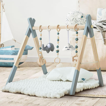 Close up view of the three wooden and two soft sensory hanging toys