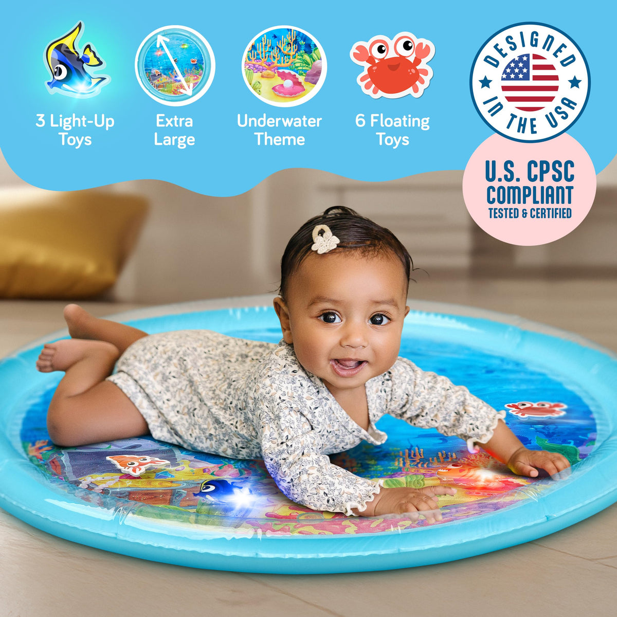 Baby playing on SplashEZ water mat with LED glowing fishes and floating toys