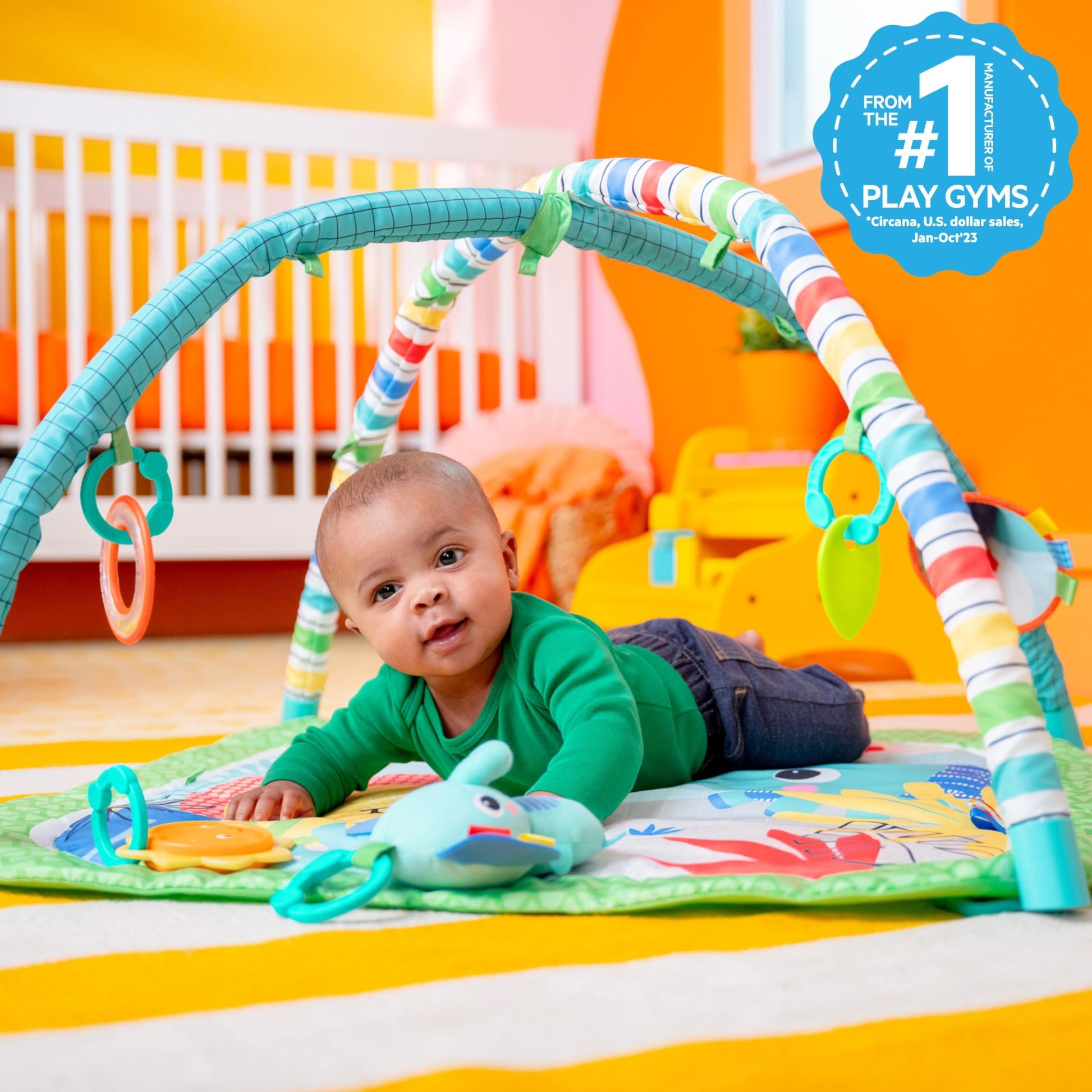 Bright Starts Wild Wiggles activity mat with hanging toys