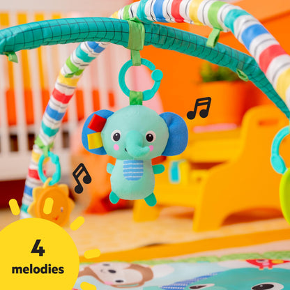 Newborn playing on Bright Starts Wild Wiggles safari mat