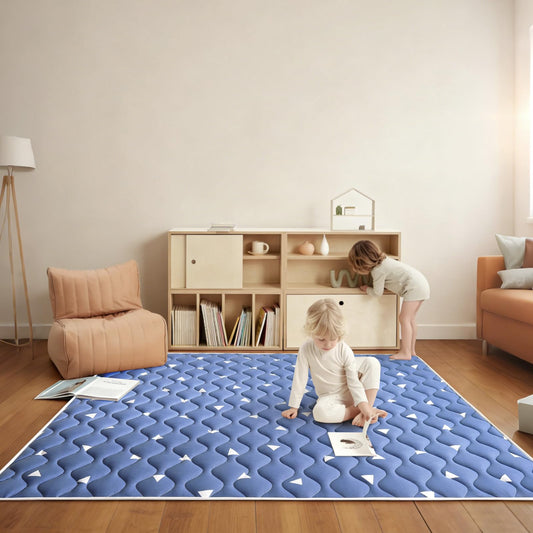 Close-up of the ultra-soft skin-friendly fabric surface on the thick one-piece crawling mat.