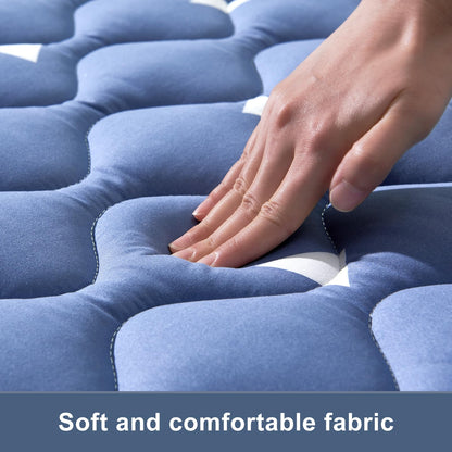 Infant infant tummy time session on the comfortable thickened foam playpen mattress pad.