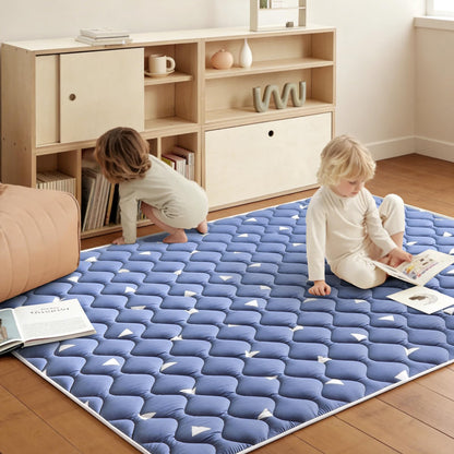 Side profile demonstration highlighting the thickness and resilience of the premium baby mat.