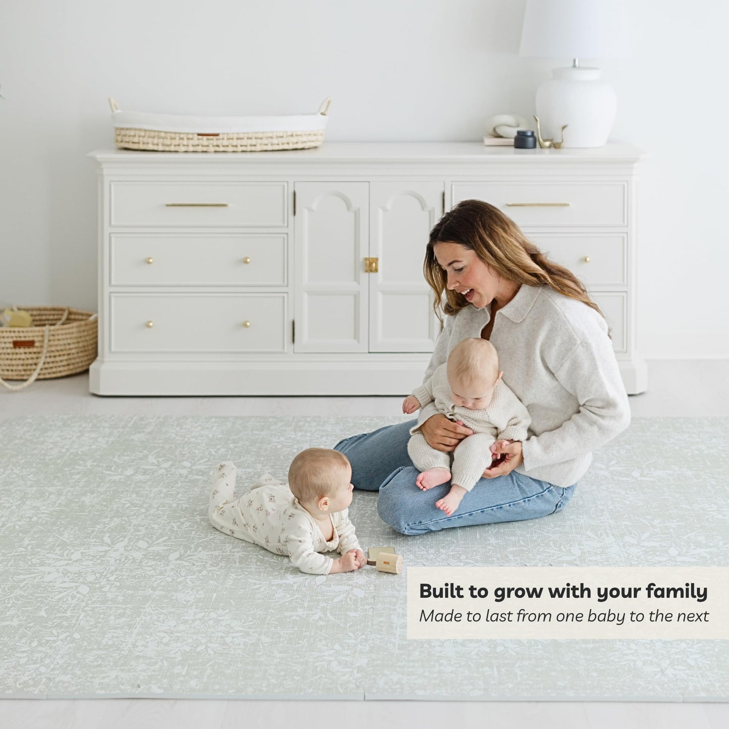 Baby doing tummy time on cushioned Little Landings Eden mat