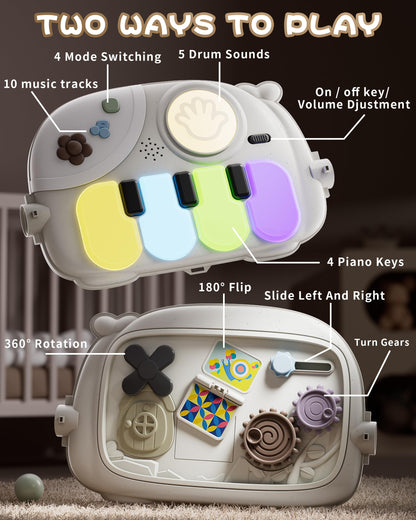 Close up of baby kick and play piano gym