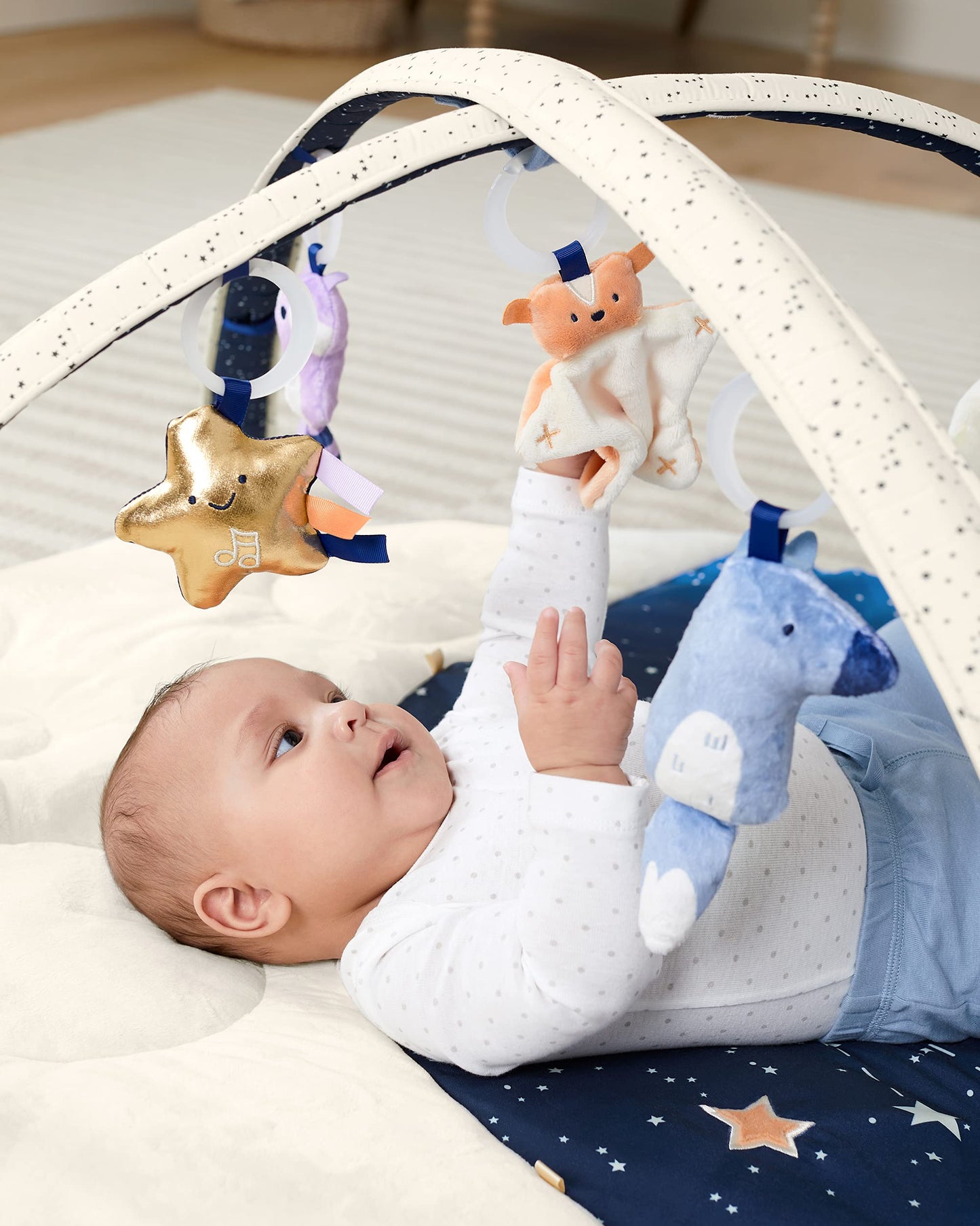 Skip Hop Tummy Time Mat with crescent moon support pillow and sensory mirror