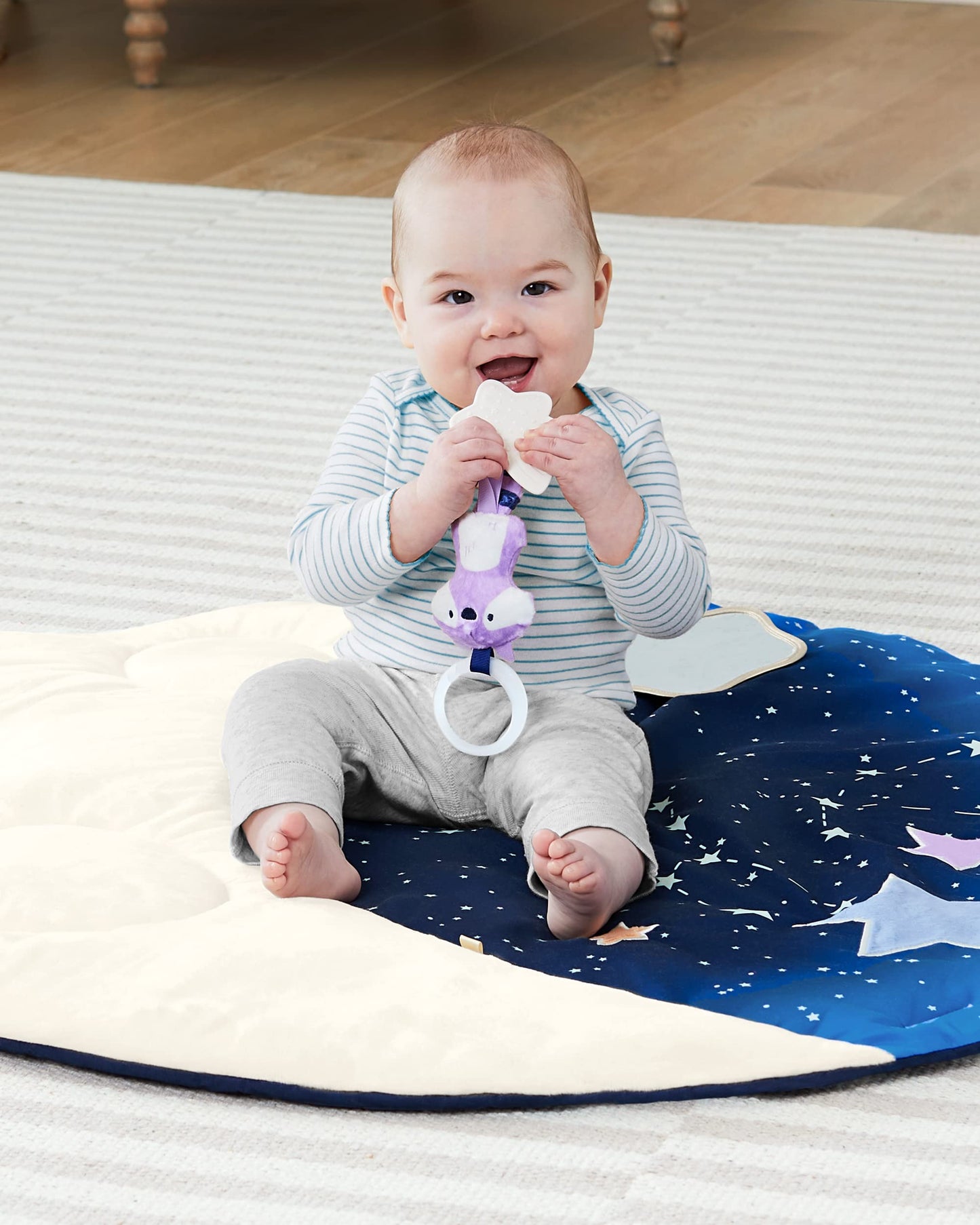 Skip Hop Celestial Dreams Grey infant playmat highlighting high contrast starry design