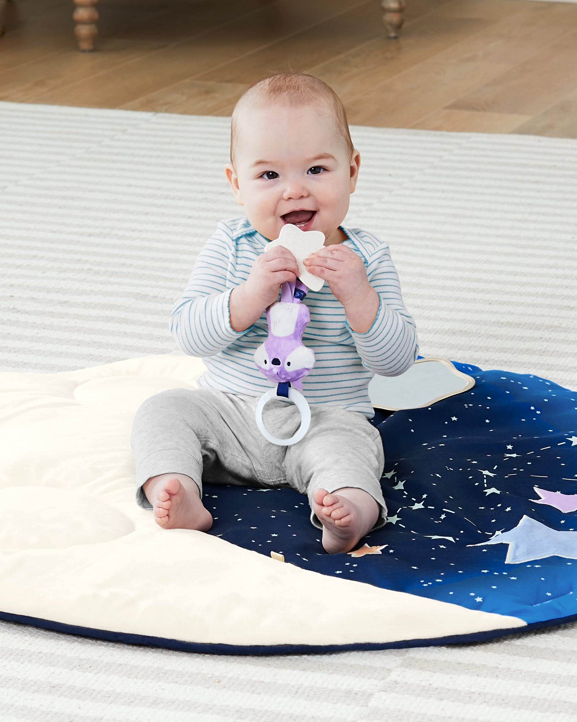 Skip Hop Celestial Dreams Grey infant playmat highlighting high contrast starry design