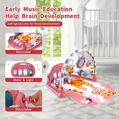 Baby interacting with light up piano on activity center