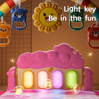 Newborn baby using Al Ying Le musical kick and play gym