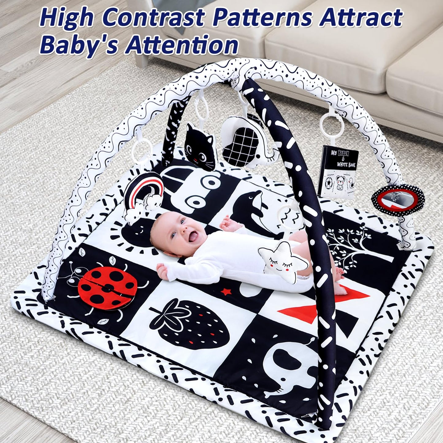 Newborn playing on Poycuna high contrast sensory activity mat