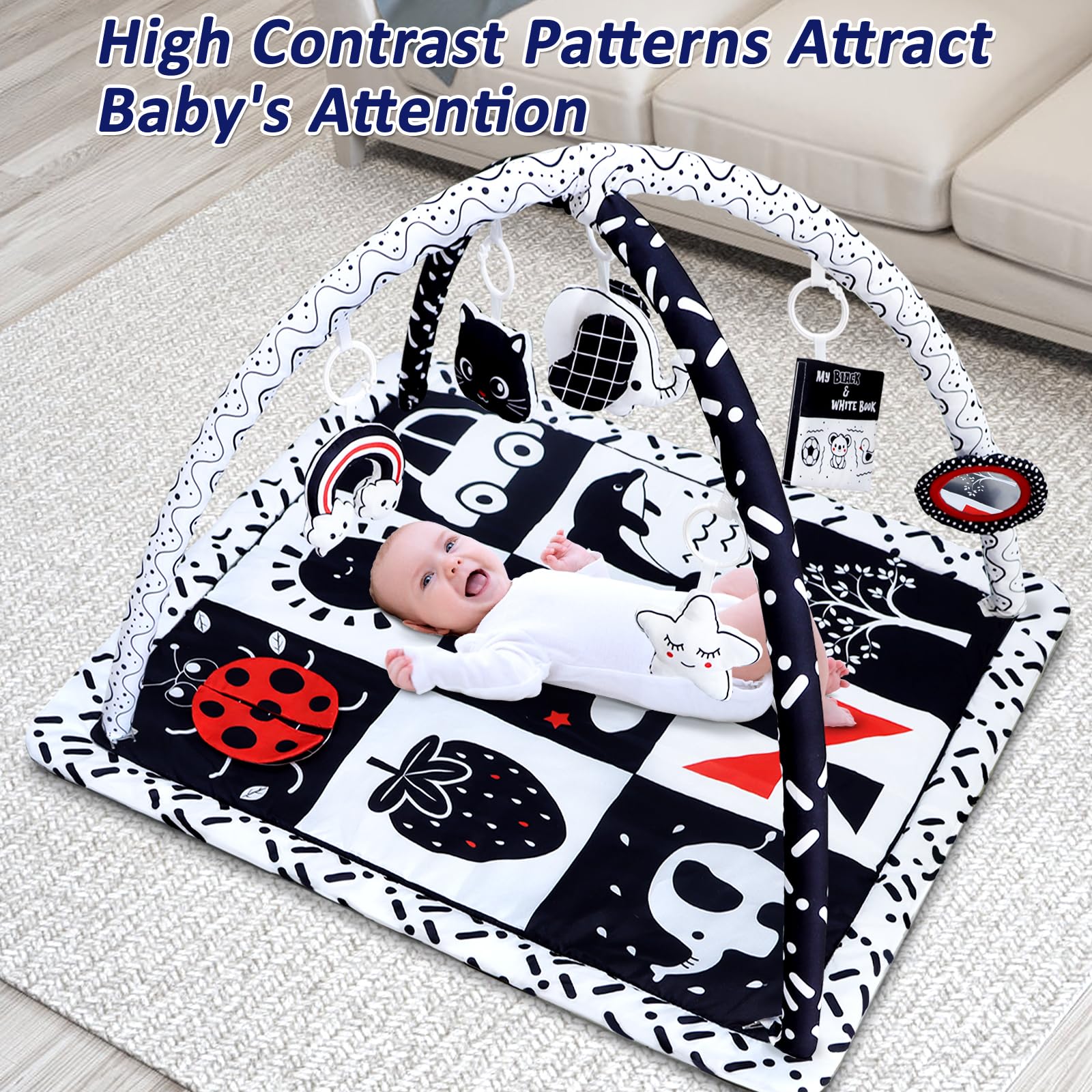 Newborn playing on Poycuna high contrast sensory activity mat