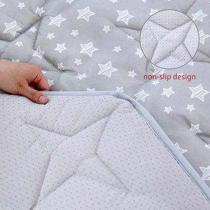 Moonsea grey star infant play rug laid flat inside a portable play yard.
