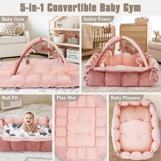 Pink baby activity mat configured as a tummy time station