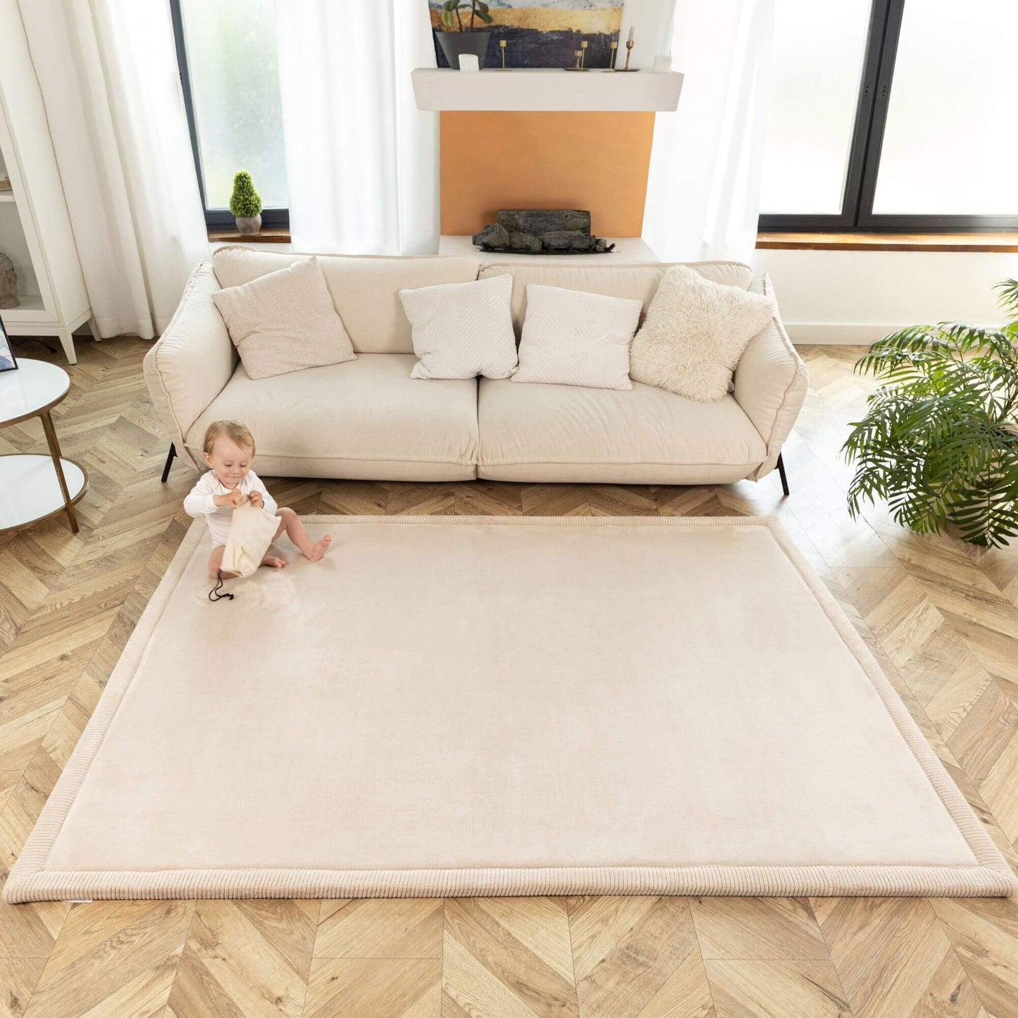 Hakuna Matte beige play mat showing soft coral velvet texture