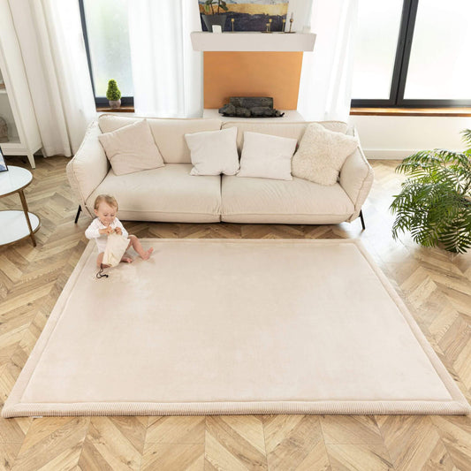 Hakuna Matte beige play mat showing soft coral velvet texture