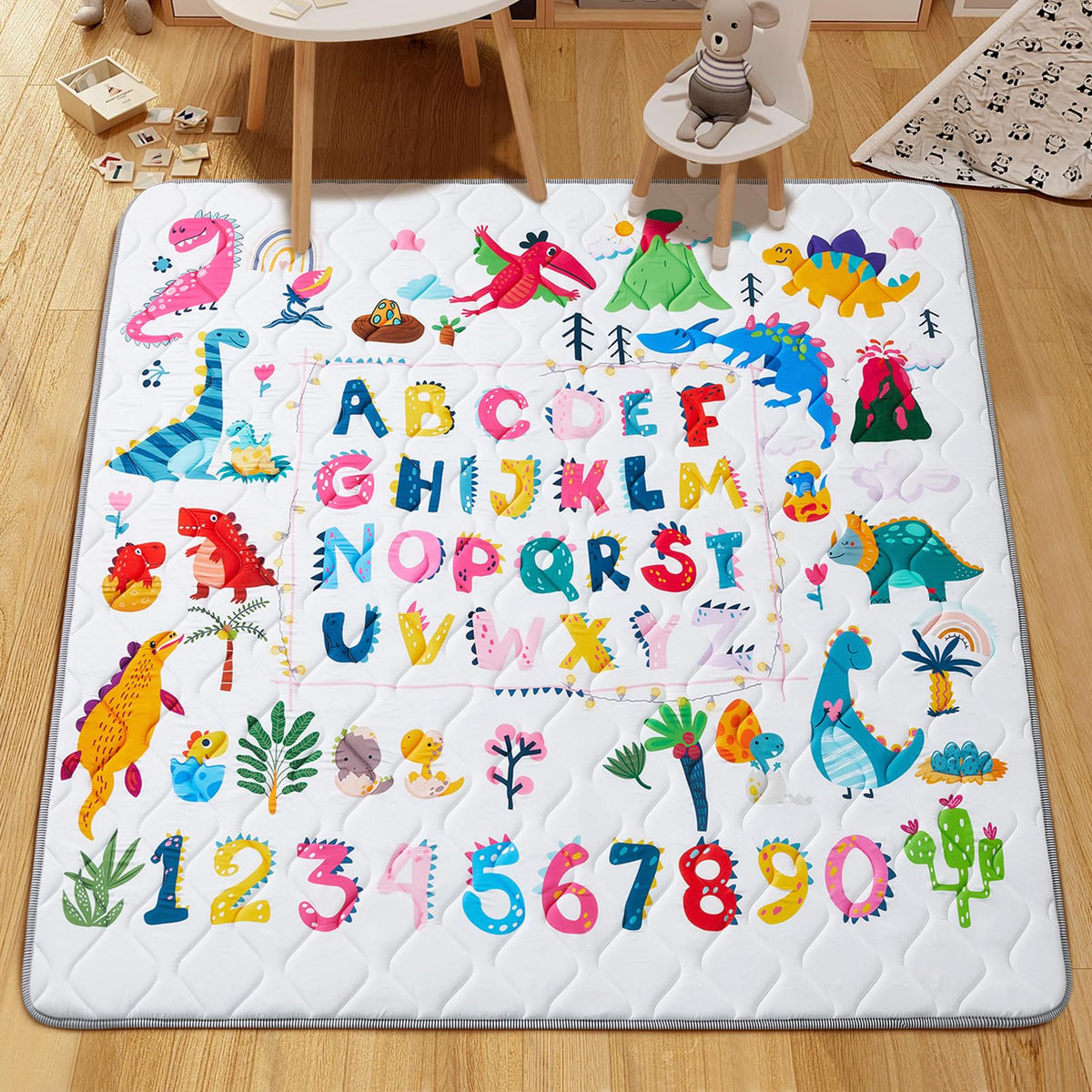 TreeBud thick foam crawling mat laid flat on a nursery floor.