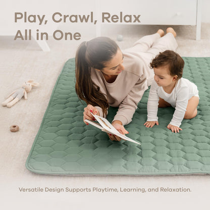 Toddler sitting comfortably on plush Fern green play mat