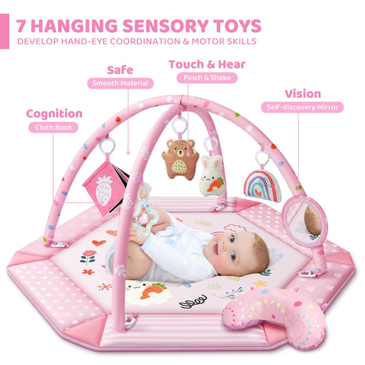 Infant playing with sensory toys on Jyusmile activity mat