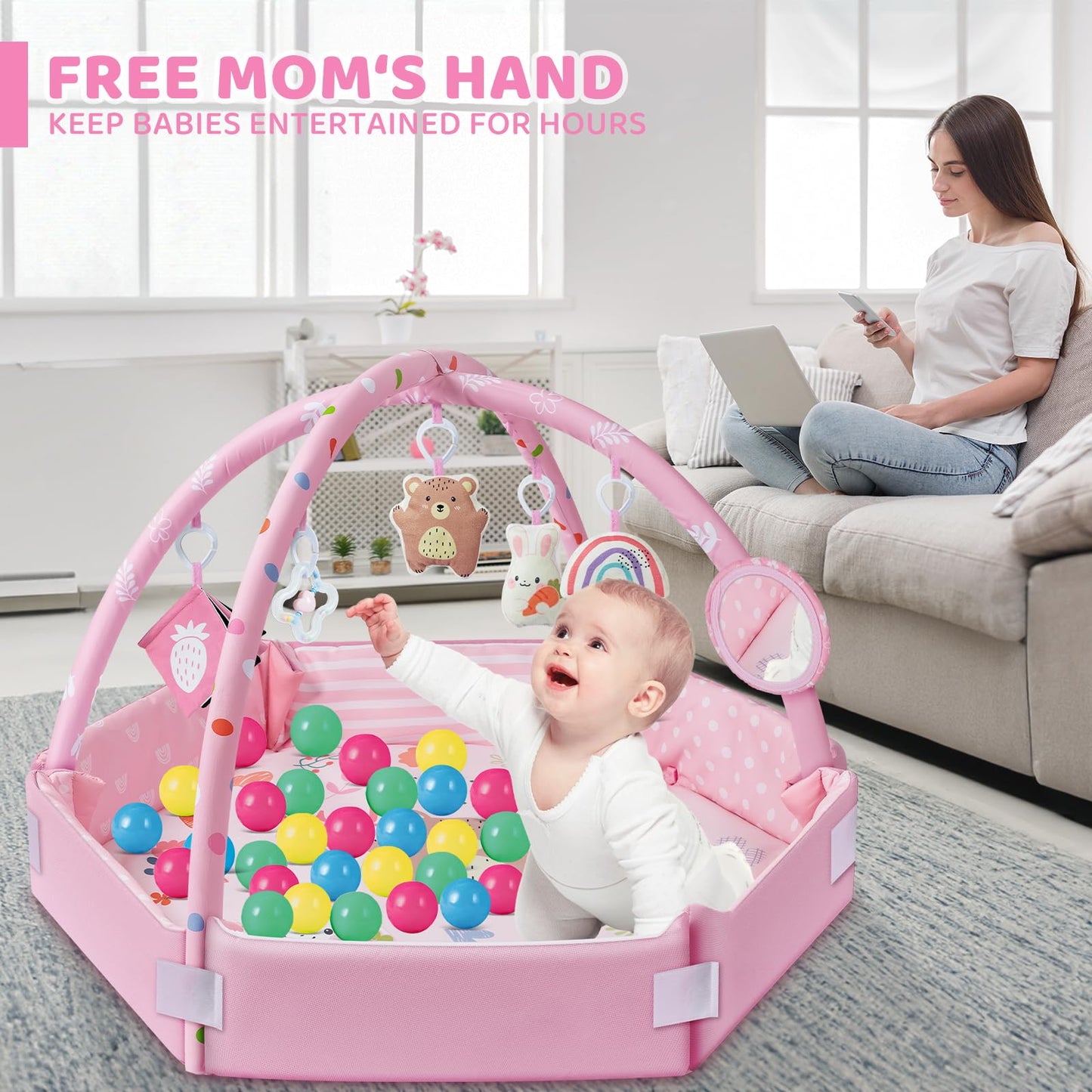 Top down view of pink baby tummy time activity mat