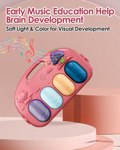 Infant sensory toys including rattles and a flower mirror hanging from the pink activity arch