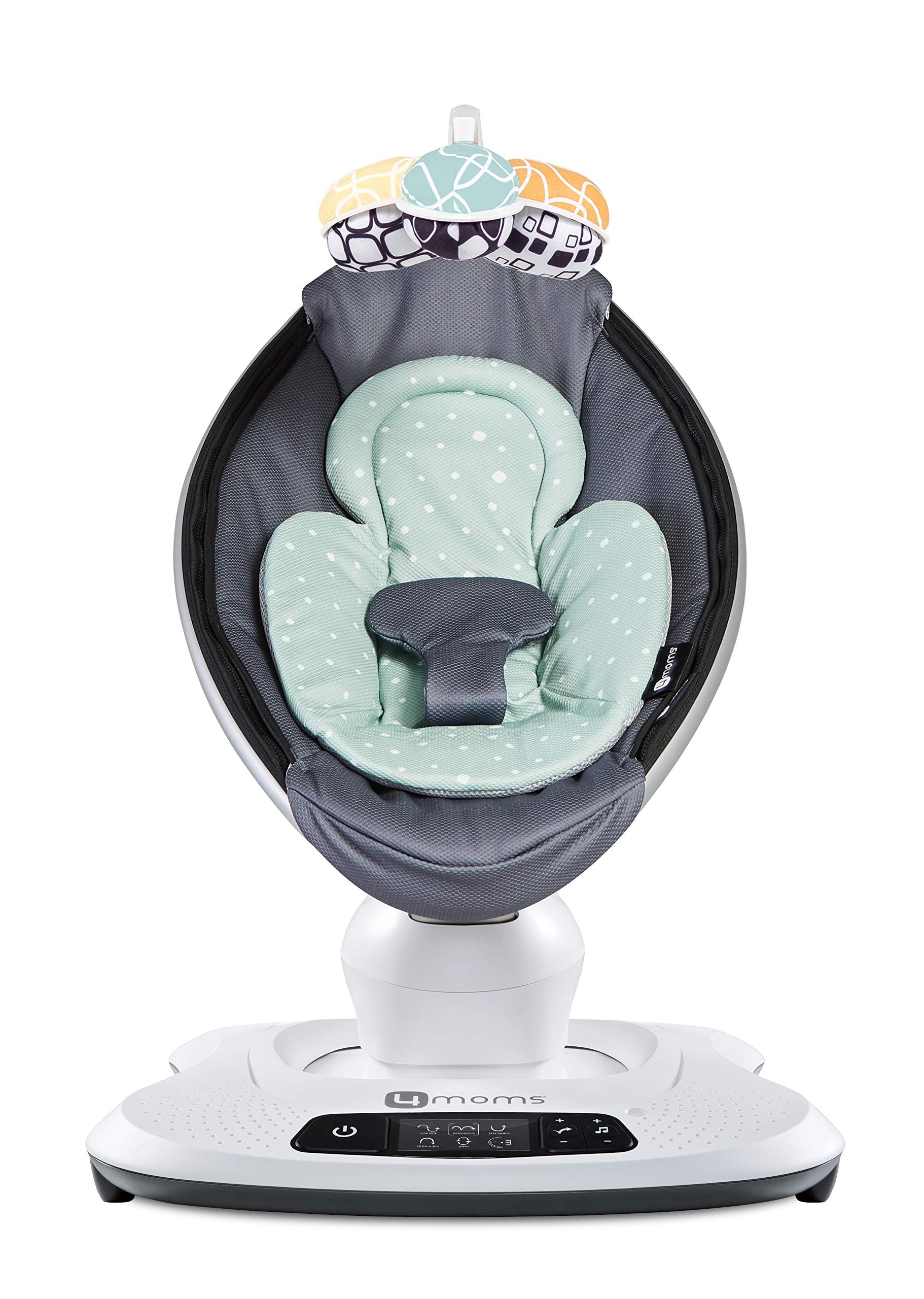 4moms infant insert attached to a baby swing showing harness fit