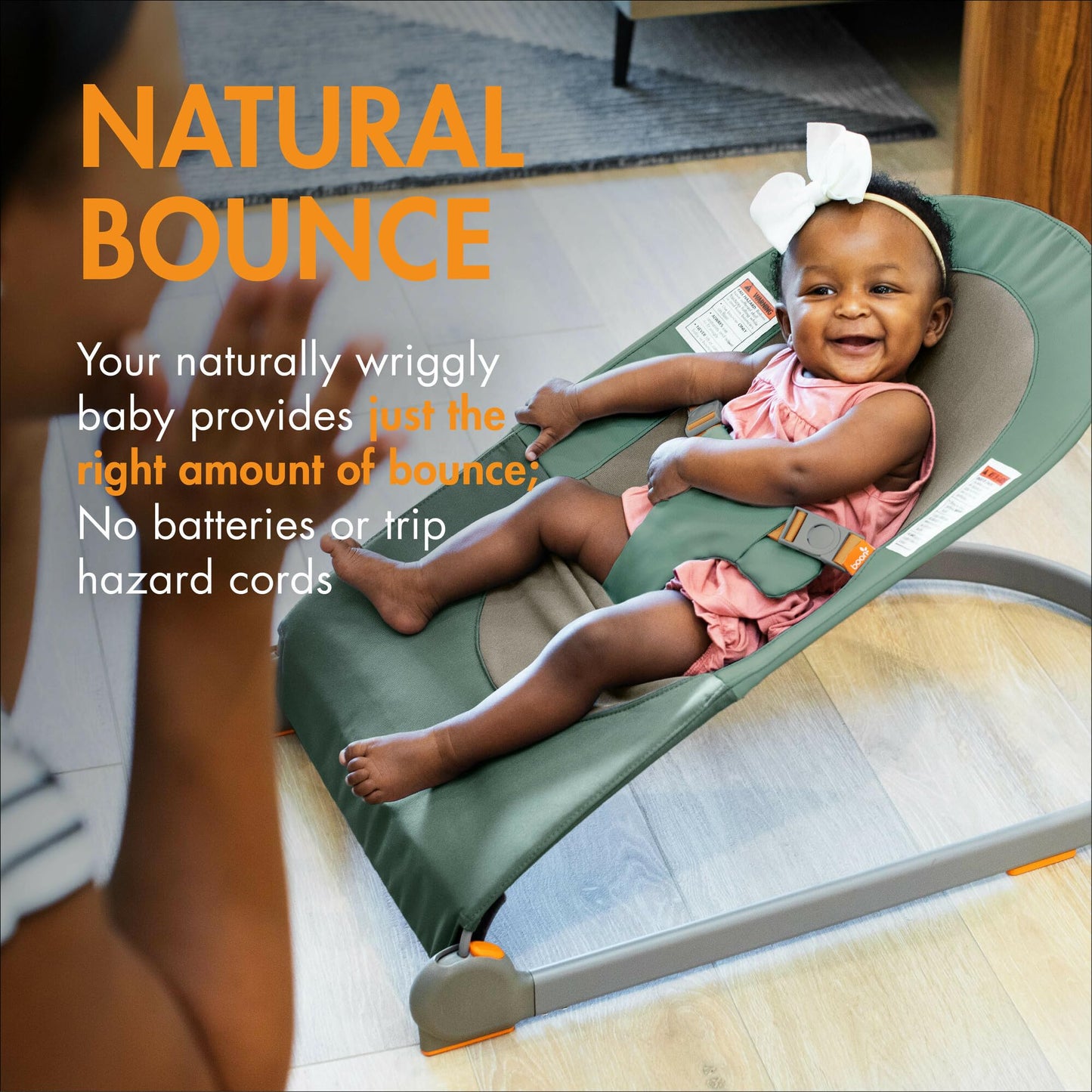 Boon Slant baby bouncer folded flat for portability