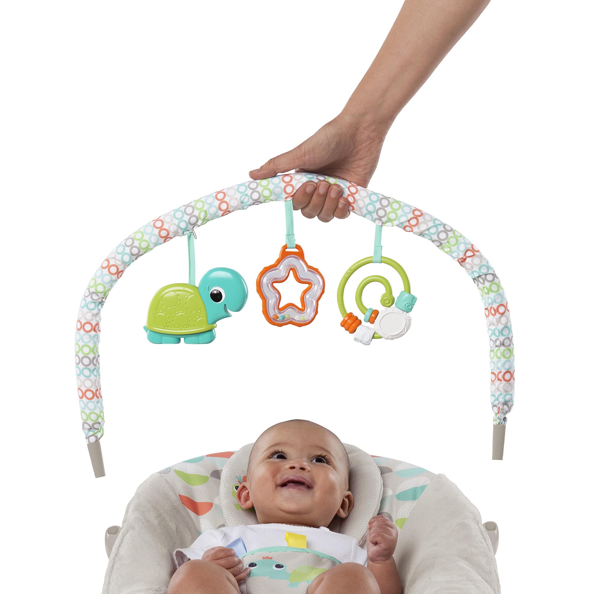 Baby relaxing in Bright Starts Happy Safari bouncer