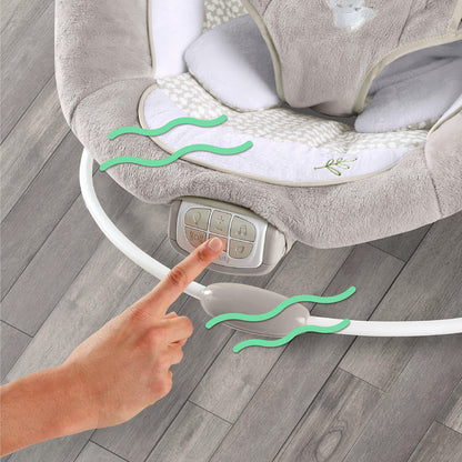 Ingenuity baby bouncer showing 3 point safety harness